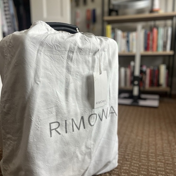 RIMOWA Other - RIMOWA White Protective Luggage Cover with Tag